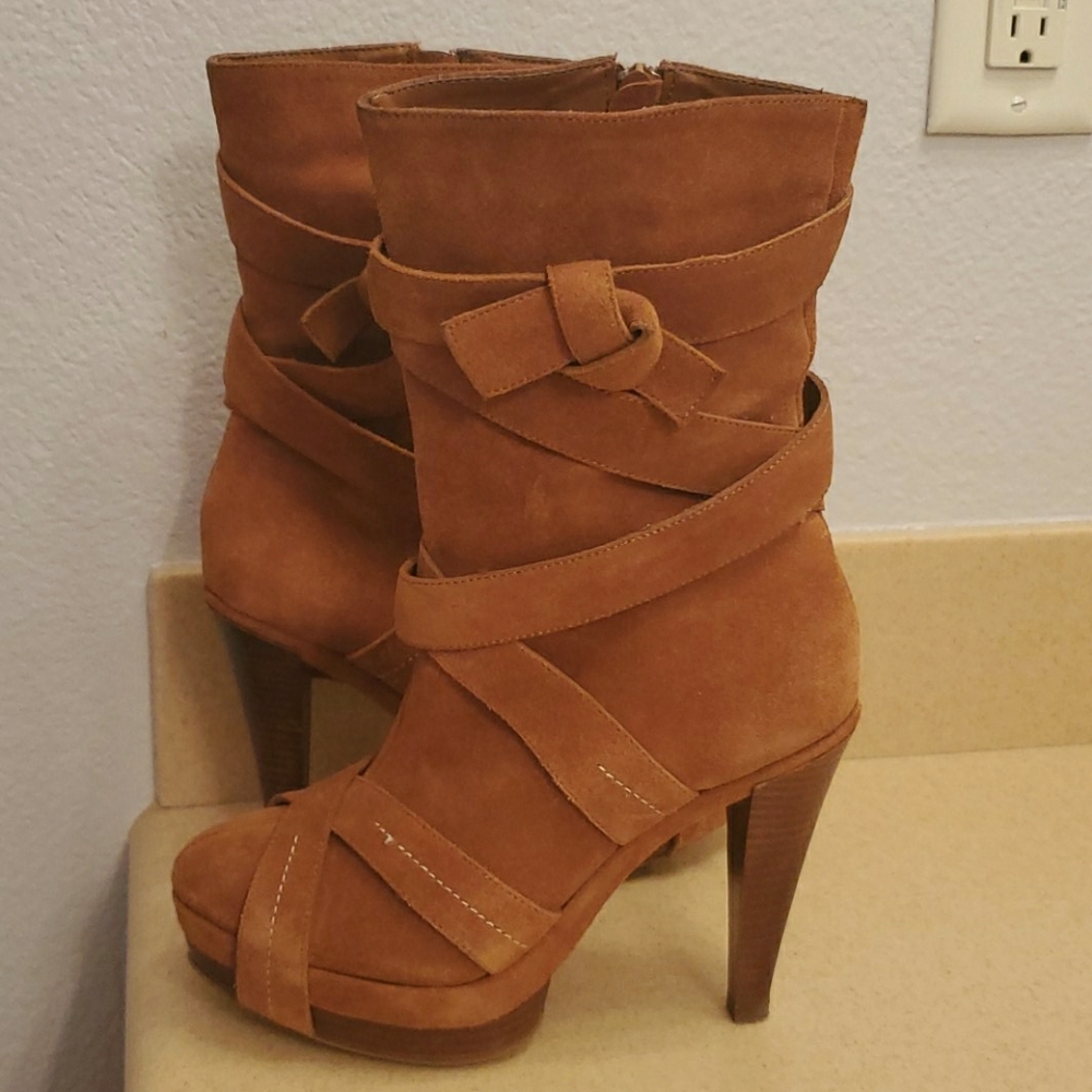 Brown Suede heeled boots.